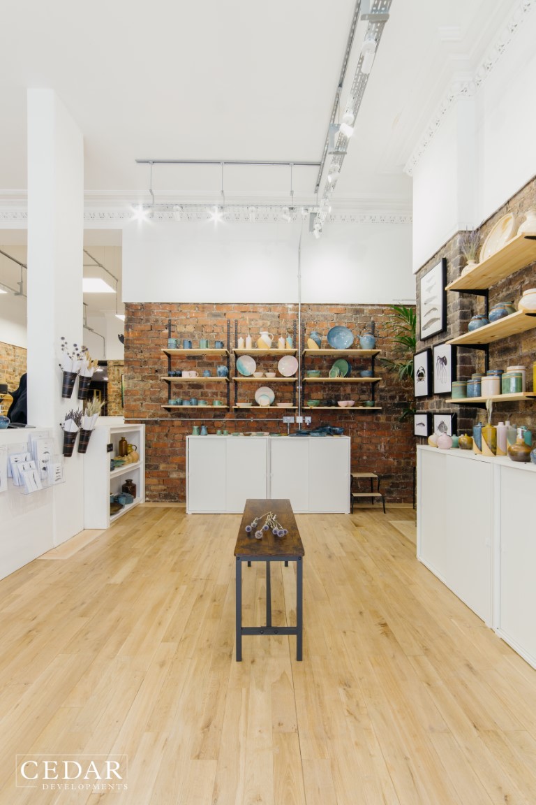 edinburgh-period-shop-renovation-main-display-wooden-floor-shelving-unit