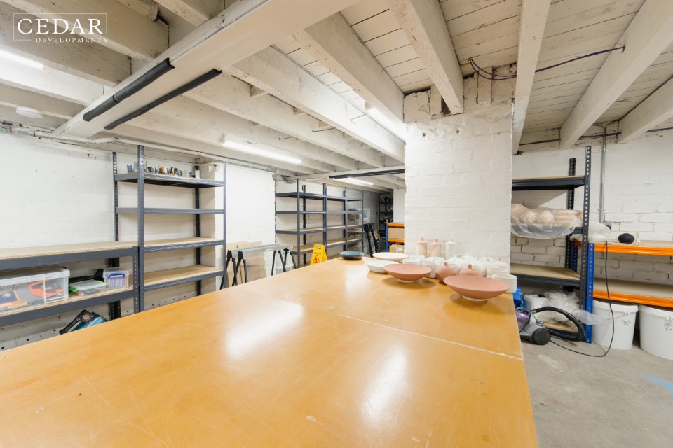 edinburgh-pottery-shop-basement-work-area-table-and-storage