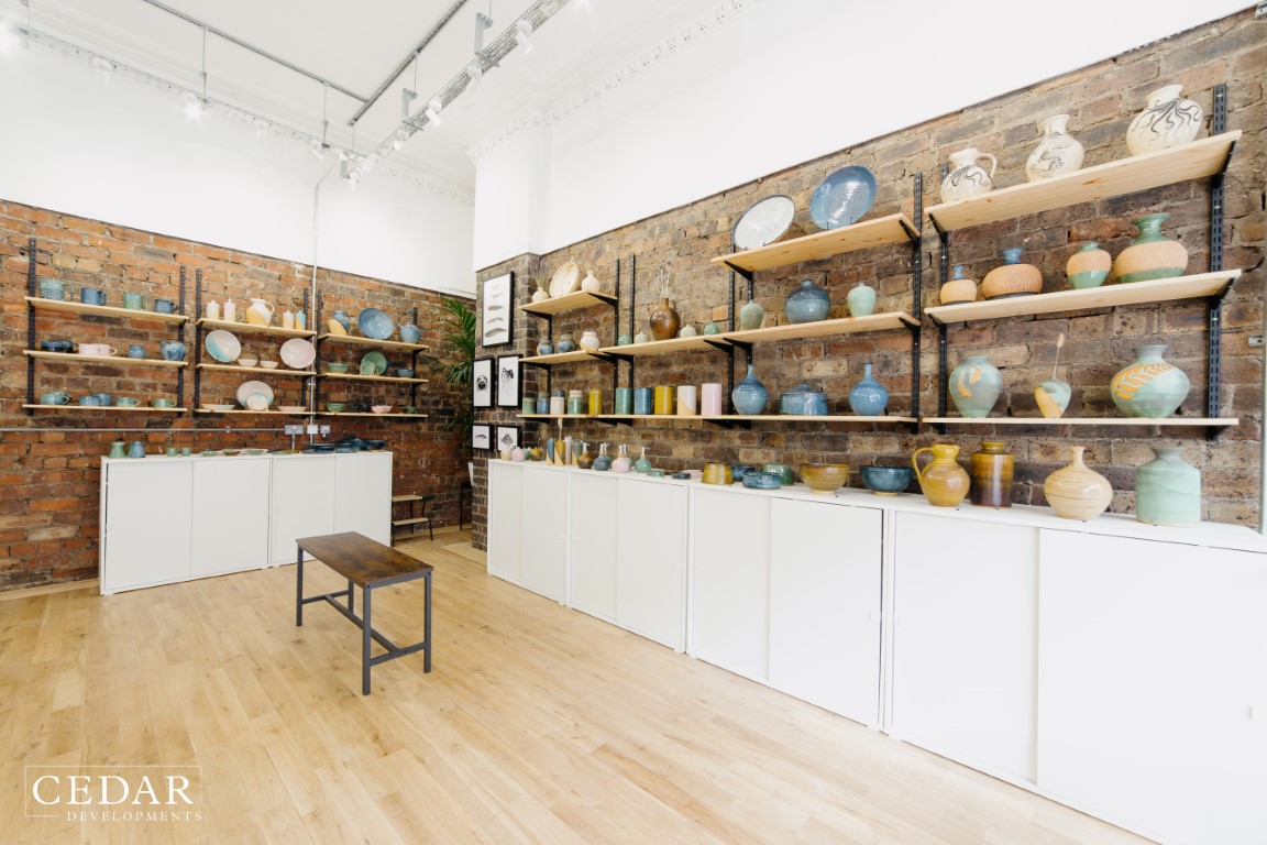 edinburgh-pottery-shop-fitout-display-area-cabinets-wooden-floor-lightin