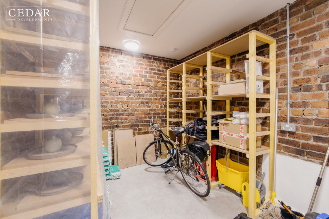 edinburgh-pottery-shop-renovation-storage-area-original-brickwork-wall