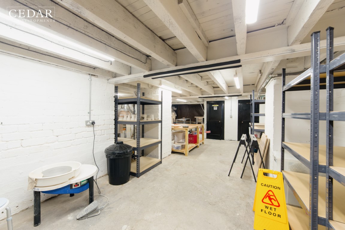 edinburgh-shop-fitout-basement-shelving-solution