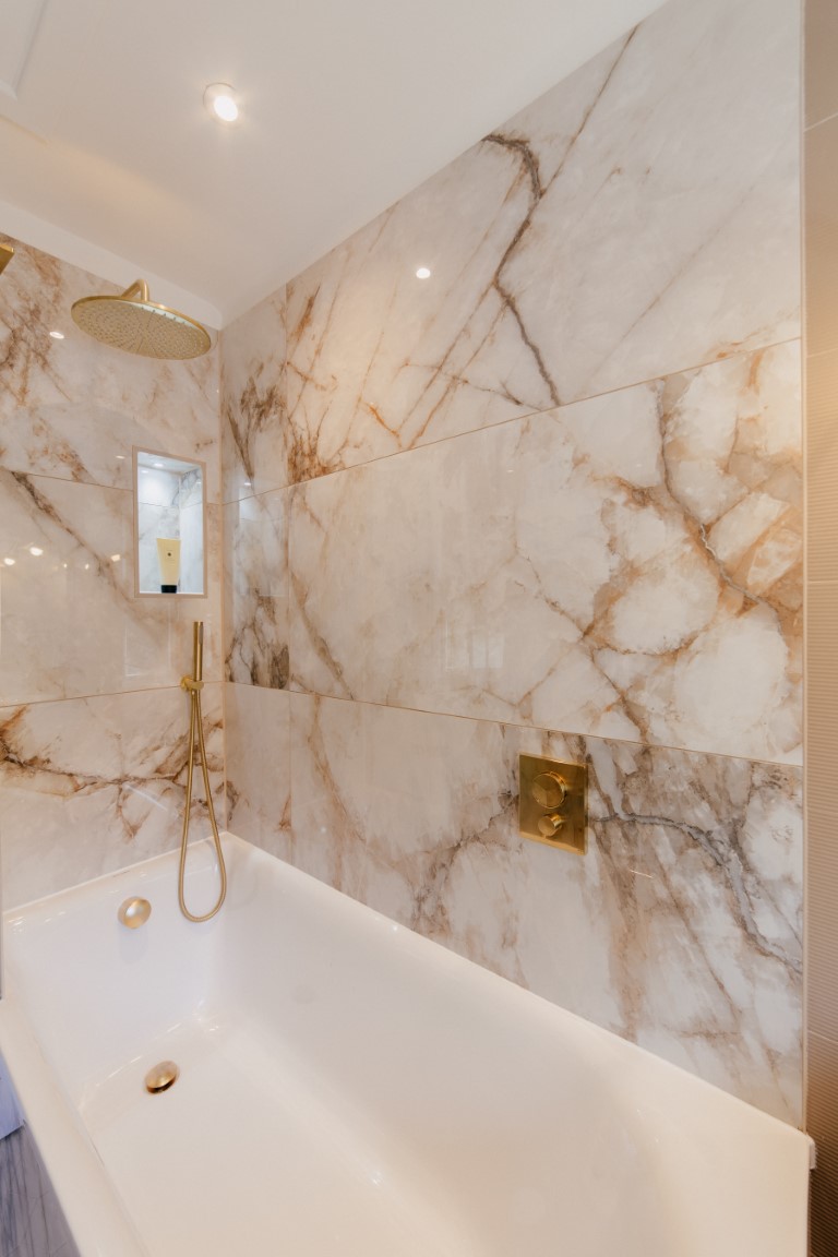 premium-renovation-services-edinburgh-bathroom-waterfall-showerhead-marble-tiles-medium